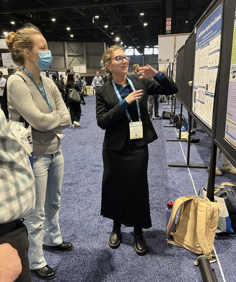 Sara Mitchell presenting a poster at SfN 2024