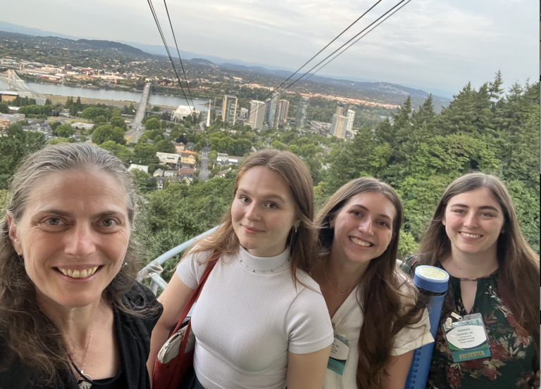 Hanna, Anna, Faith, and Hannah at DoHAD conference in Portland