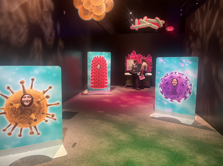 Lab members as cells in a science museum in portland